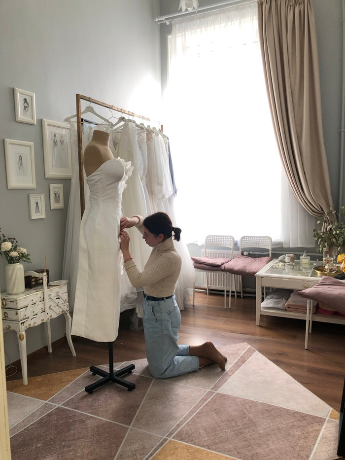 Wedding Dress Alterations After Delivery: Working With a Local Tailor