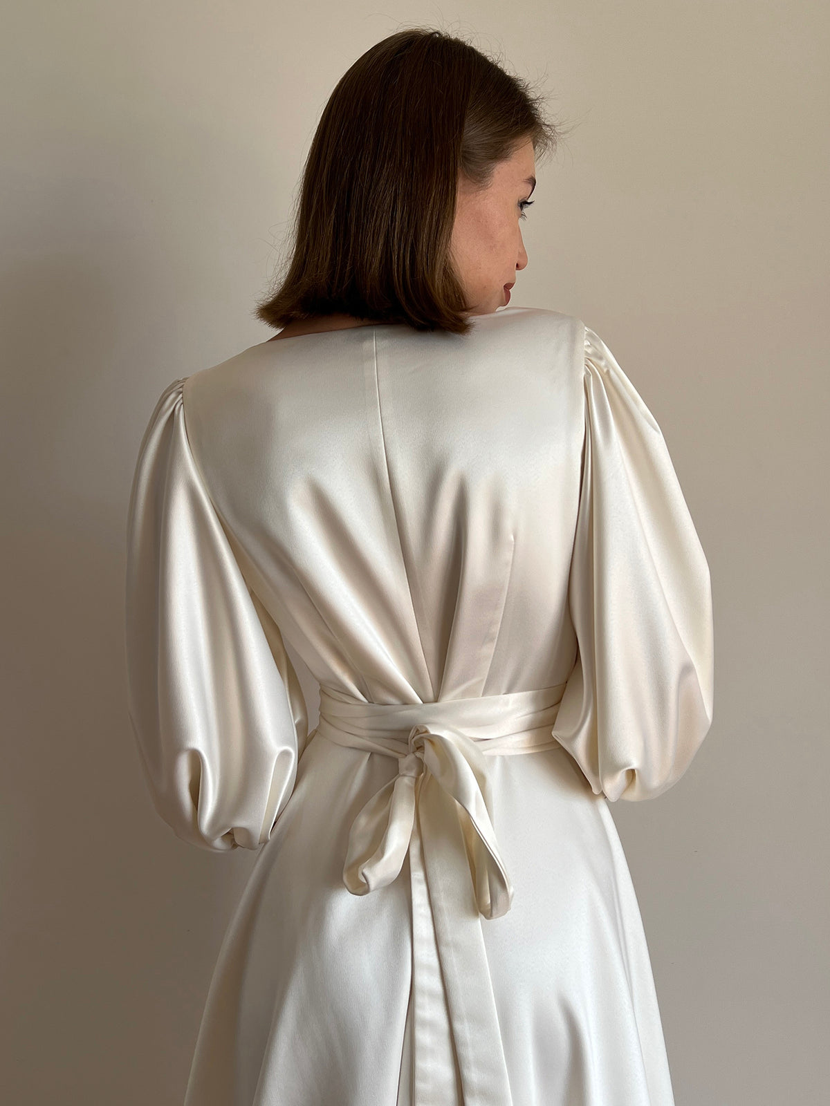 Daniella wedding dress fitted silhouette, side view