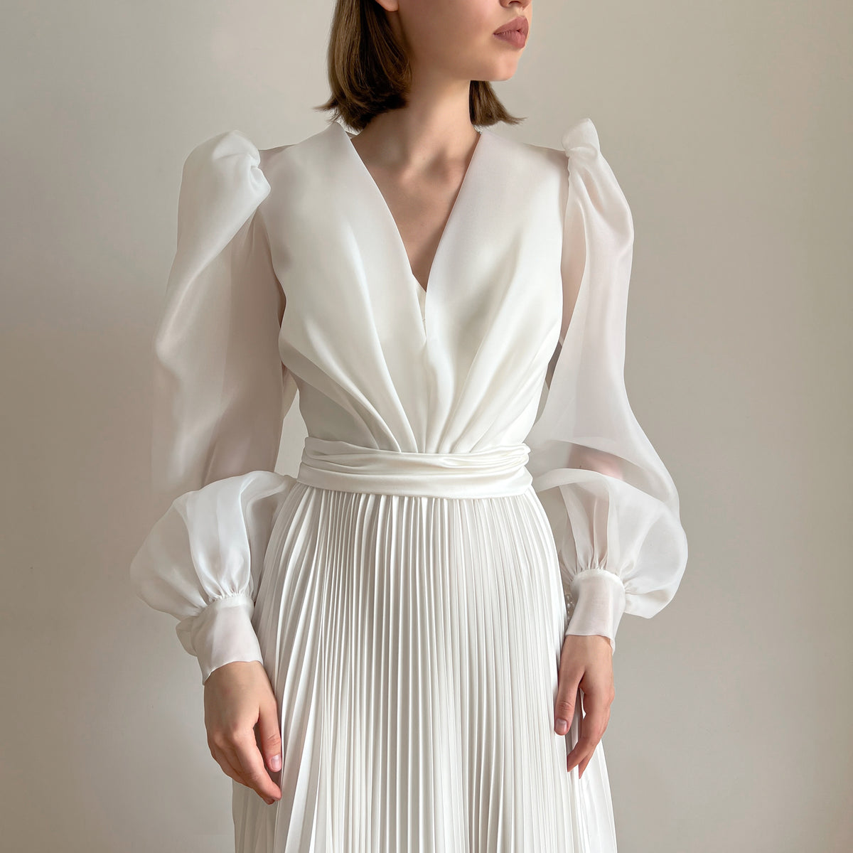 Pleated wedding dress with organza blouse, front view