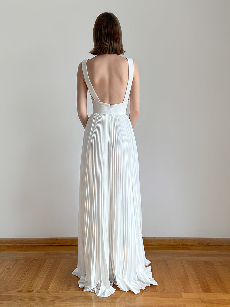 Pleated wedding dress with crepe top, side view