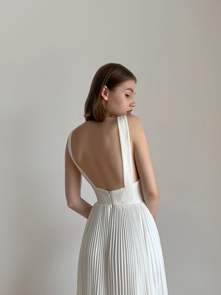 Pleated wedding dress with crepe top, open back detail