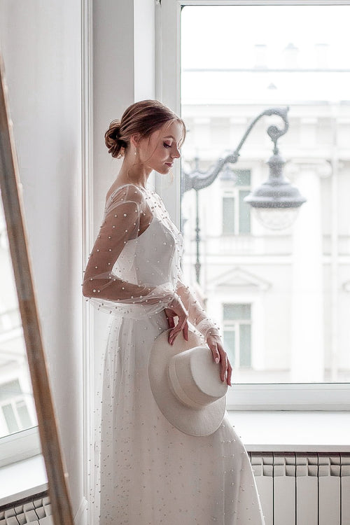 Beaded wedding dress with pearls